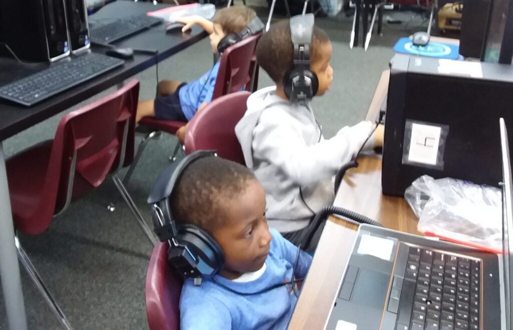 elementary students computer scaled e1591643495388